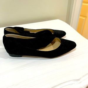 Black suede flats with ruffle strap